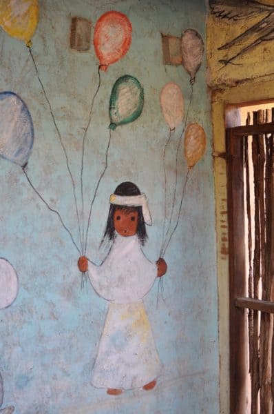 child with balloons by DeGrazia 1 | DeGrazia Gallery in the Sun - Attraction Guide