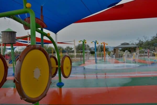 Tractor at Marana Splash Pad | Guide to Gladden Farms Community Park – Parking, Hours, Parties!