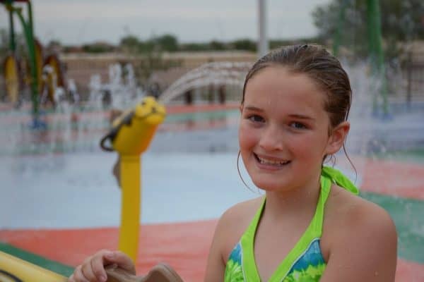 child at Marana Splash Pad | Guide to Gladden Farms Community Park – Parking, Hours, Parties!