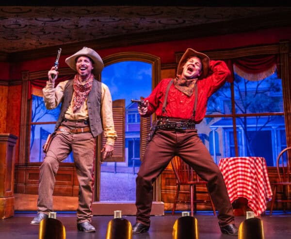 Jonathan Heras as Curly Bill Jake Chapman as San Pecos Sam Belle of Tombstone Gaslight Theatre Tucson | The Gaslight Theatre - Tucson's Only Dinner Theatre Experience!
