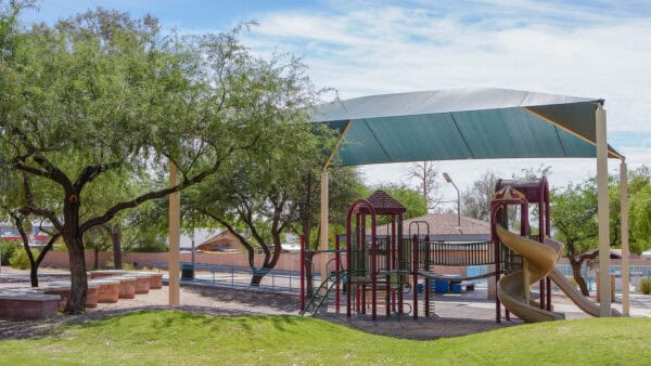 Covered Playground Splash Pad in Background Balboa Heights Park Tucson | Park Profile: Balboa Heights Park